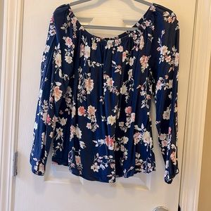 White House Black Market Navy blue floral blouse. Fits more like a medium.